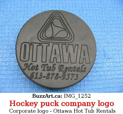 Company Ottawa Hot Tub Rentals engraved on hockey puck